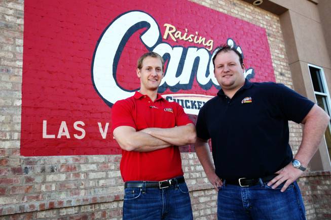 Justin Micatrotto (left) and Joe Micatrotto Jr. of Micatrotto Restaurant Group are photographed Friday, Oct. 29, 2010, outside of their Las Vegas Boulevard location of Raising Cane's.